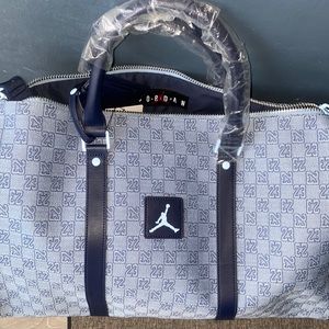 Nike air Jordan monogram travel bag.